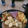 Chocolate chip pancakes, banana maple syrup; red pepper, onion, cheddar eggs; red pepper home fries; ham; espresso.