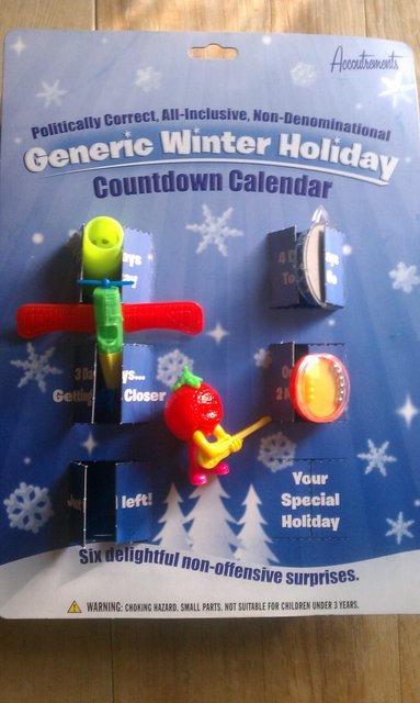 Day 5 of my Generic Winter Holiday countdown calendar -- a tomato/orange with guitar.