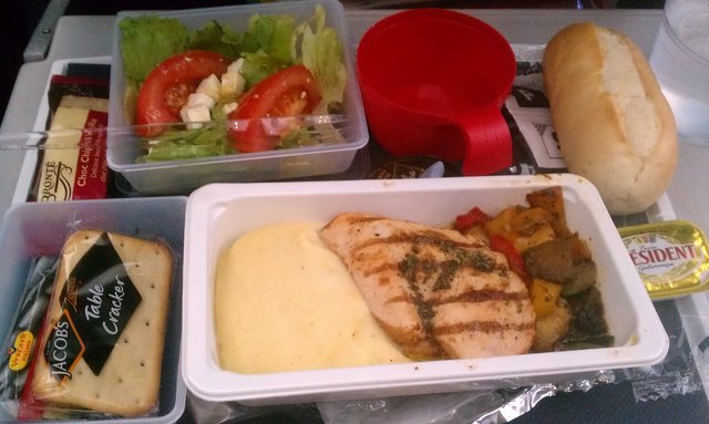 Airline food! Grilled chicken, mashed spuds, veggies, other bits. (Delta 137 from Pisa)