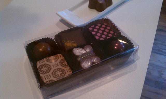 Cherry, peanut butterfly, chai tea, hazelnut, coconut curry, raspberry chocolates.