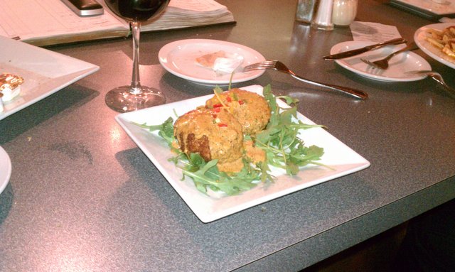 Stacy got crab cakes with cajun cream sauce. (Rachel got the seabass)