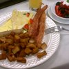 Spinach, tomato, feta omelettes; home fries, bacon (yay), pork sausage.