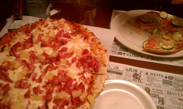 Hawaiian pizza and Sammy's Special (hippie vegetarian) pizza.