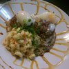 Loco moco: burger patties over white rice, with country gravy, poached eggs, mac salad.