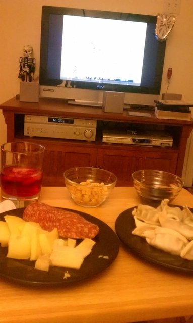 #SuperBowl party for one: pork dumplings, jarlsberg, manchego, salami, peanuts, Stappi.