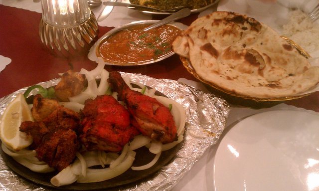 Tandoori dinner: Chicken tandoori, chicken tikka, boti kebab, chicken curry, naan.