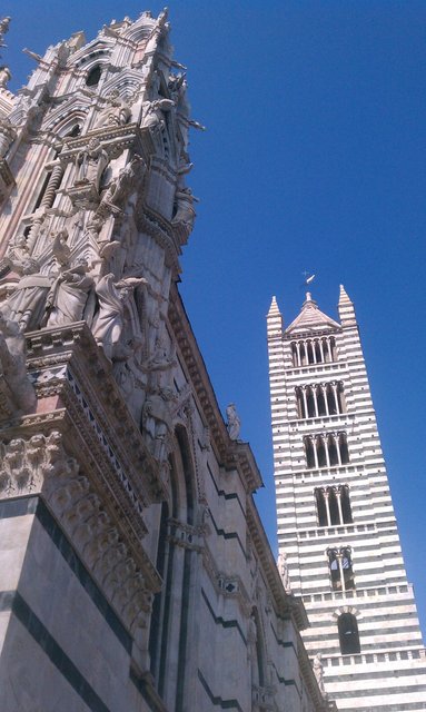 The stripes give the tower an emo or Tim Burton feel. (Duomo, Siena)