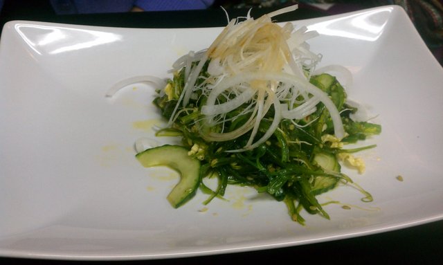 Seaweed salad with cucumber & onion.