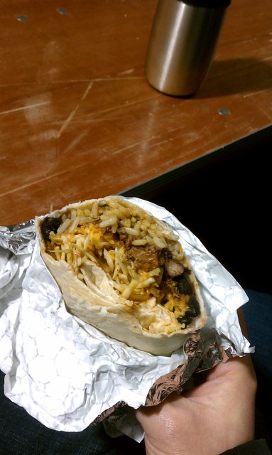 Enjoying a burrito at Powder Keg Festival.