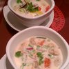 #LocalRestWeek Two bowls of tom kha (coconut milk) soup, one with beef, one with dessicated hippie bits.