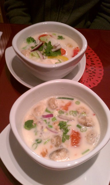 #LocalRestWeek Two bowls of tom kha (coconut milk) soup, one with beef, one with dessicated hippie bits.