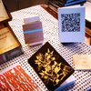 A letterpress book of poetry, via QR codes (by Chris Fritton).