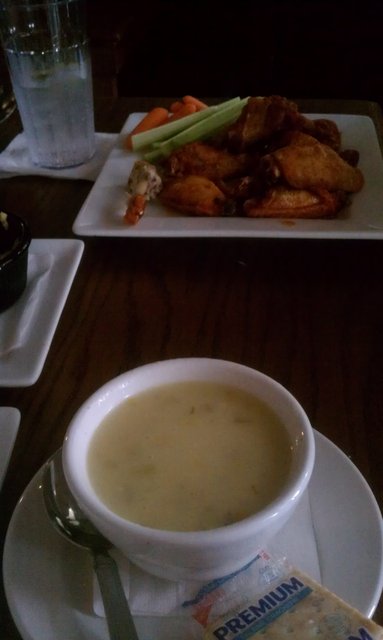 Chicken bacon chowder, house wings in the background.