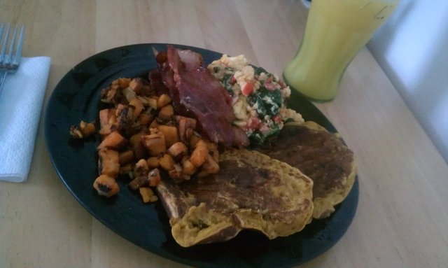 Bacon; pumpkin, whole oat, buckwheat, chocolate chip pancakes; sweet potato home fries; spinach, tomato, mozzarella eggs.