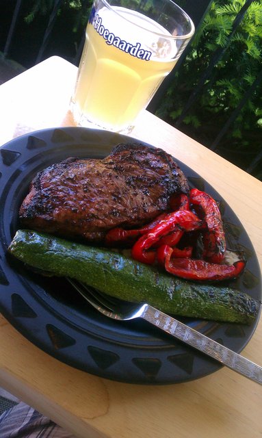 Strip steak (olive oil, cracker pepper, minced garlic, salt) and grilled zucchini, sweet red pepper.