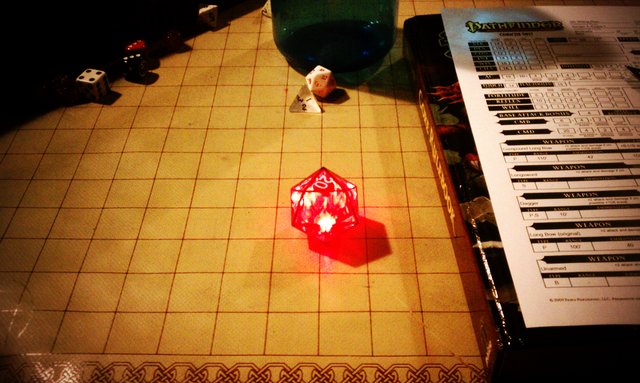 This is how @truthbluth rolls (my @ThinkGeek D20 that blinks on natural 20s).