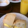 Breakfast sandwiches, latte, OJ. #BUFfoodies