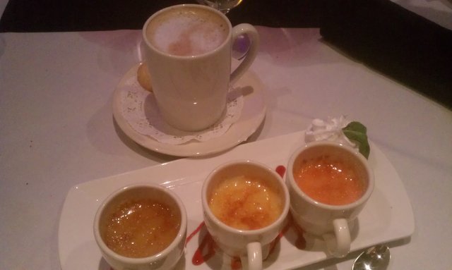 Cappuccino and flight of creme brulee (chocolate, vanilla, strawberry).