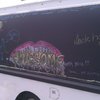 The @WholeHogTruck has a chalkboard on one side, with some art from @citybration attendees.