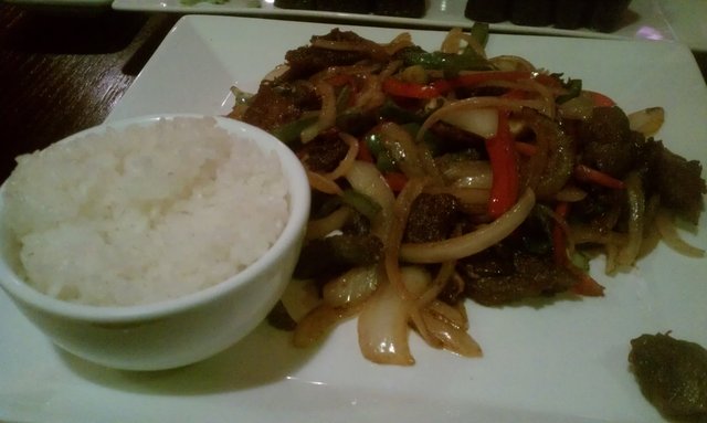 Beef with peppers, onions, asparagus, in basil ginger sauce.