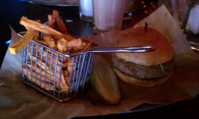 Sicilian burger: 8oz. flattened meatball, mozzarella, arugula; sweet potato fries.