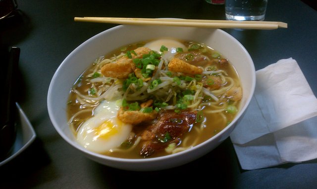 Bacon ramen, smoked chicken bacon broth, thin-sliced bacon, bean sprouts, egg, garlic chips, pork rind.