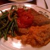 Slightly spicy creole meatloaf with creole sauce, bourbon mashed sweet spuds, veggies.