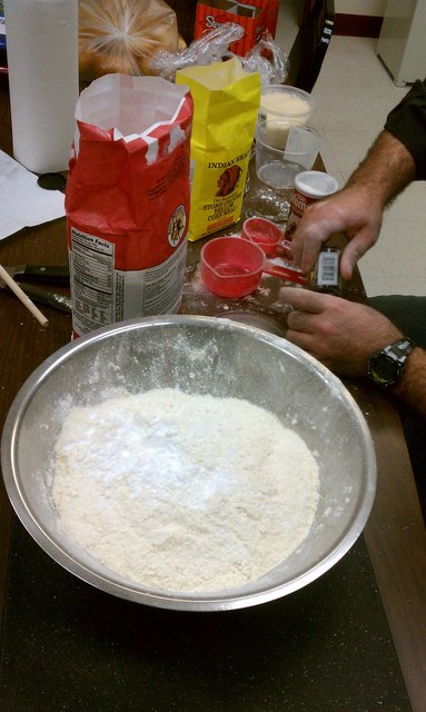 John is making dumplings for the soup. From scratch. In the office. This guy doesn't screw around.