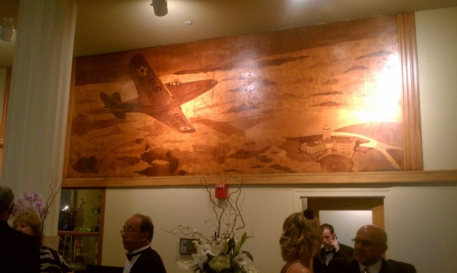 Wood inlay fighter (P-51?) mural in the lobby.