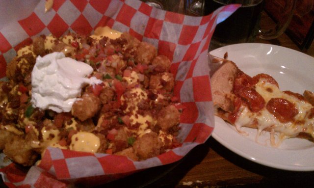 Bistro tater tots. I had them add bacon. I wasted (befouled) a pig.