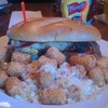 Bacon, cheddar, fried egg burger (not on menu); garlic, parmesan tots.