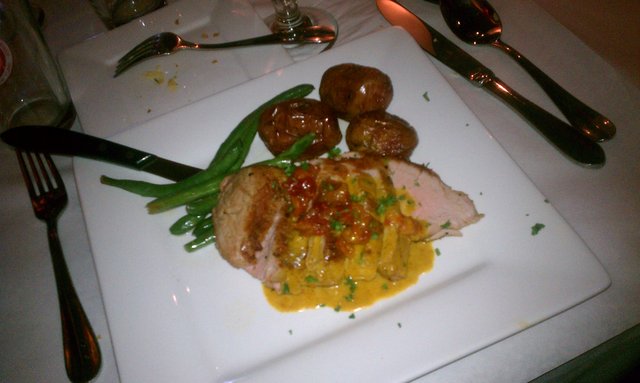 Tomato peach chutney, yellow curry sauce over dry-rubbed pork tenderloin. Red spuds, green beans.