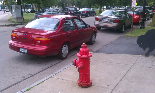 CAE 3351, Elmwood & Bidwell, blocking hydrant & driveway.