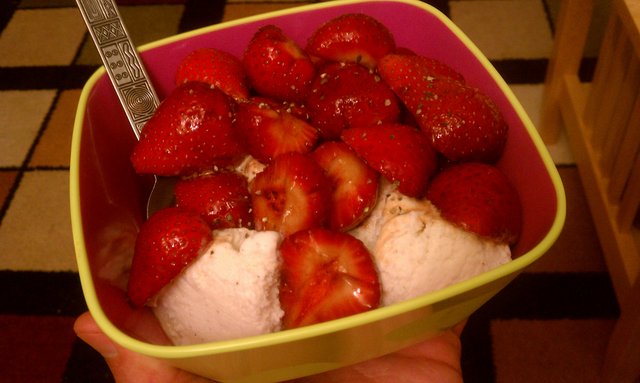 Fresh strawberries, balsamic vinegar, cracked pepper over vanilla ice cream.