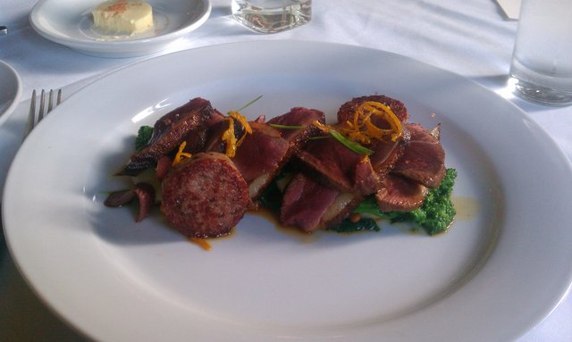 Magret Duck a l'Orange: pine gnocchi, broccoli rabe, orange jus.