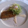 Lyonnaise Salad Terrine: poached egg, smoked bacon, frisee lettuce.