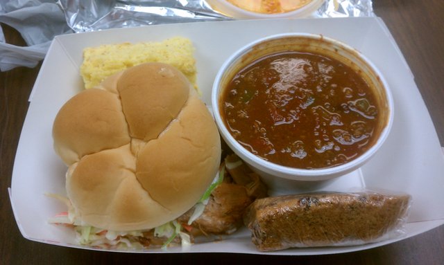 BBQ pulled pork sandwich, chili, corn bread, peanut butter chocolate bar.