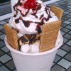 Frozen hot chocolate ice cream, toasted marshmallows, chocolate sauce, graham crackers, whipped cream.