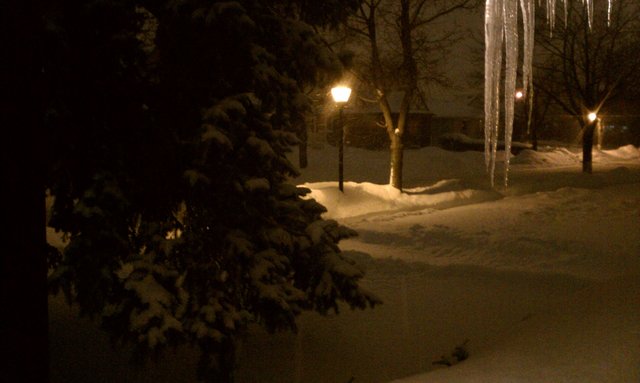 Relaxing on the porch after clearing the driveway and sidewalk.