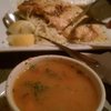 Pasta e fagioli, with a portion of chicken francese in the background.