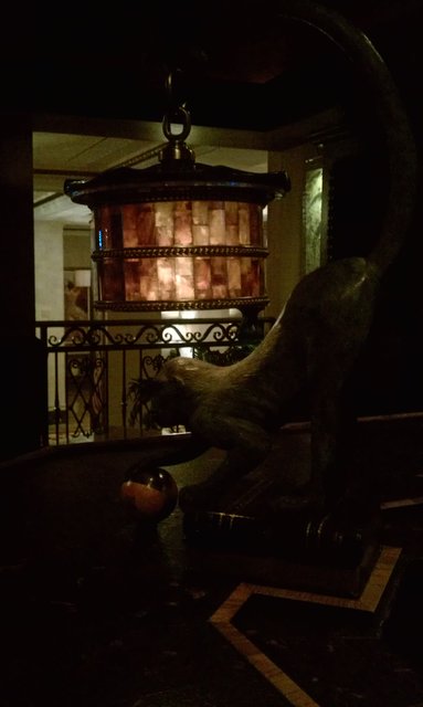 Yes, that's a monkey lamp, and no, its bum is not a bottle opener.