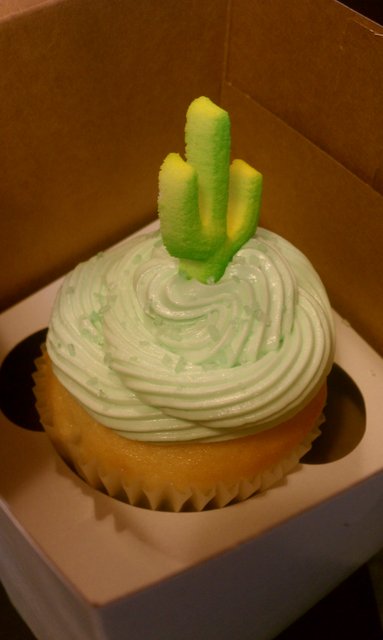 Margarita cupcake, lime tequila butter cream, granulated sugar, festive cactus.