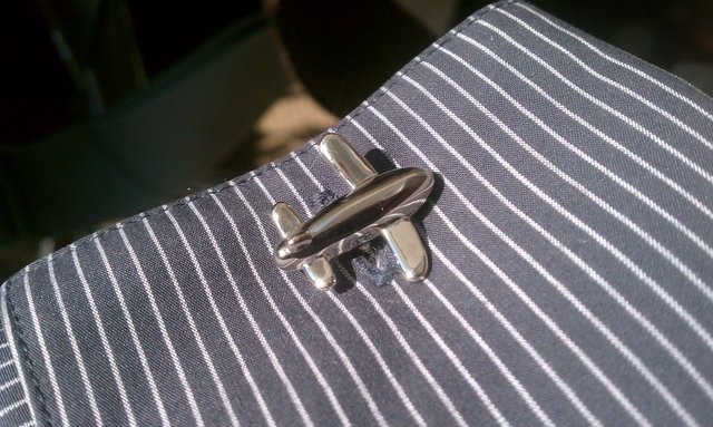 For Dan, another set of my cufflinks. Chrome aeroplanes.