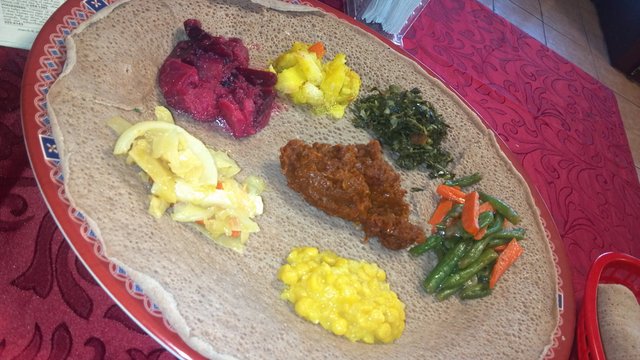 Vegetarian combo: lentils, potatoes, carrots, beans, corn, beets.