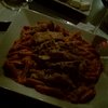 Penne with vodka, tomato, cream sauce and grilled chicken.