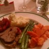 Beef tenderloin, lemon tarragon asparagus, mashed spuds with shallot butter, spiced applesauce, roasted carrots & onions.