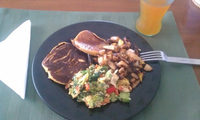 Pumpkin buckwheat pancakes; broccoli, red pepper eggs; cinnamon home fries.