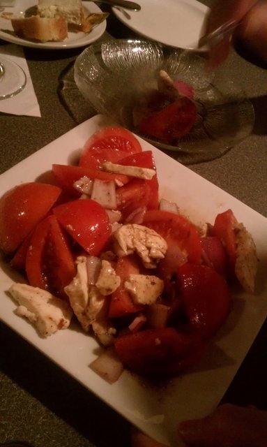 Bocconcini salad, with guest thieving by my dad.