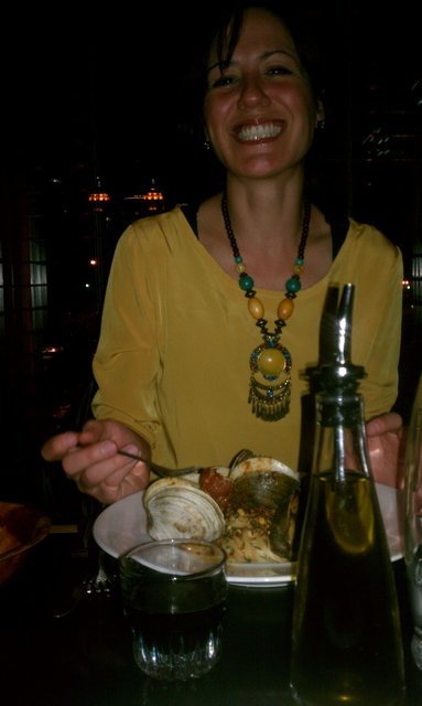 Rachel is enjoying her linguini and clams. And wine.