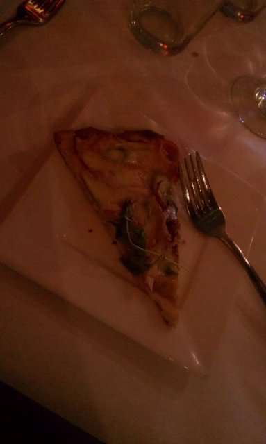 Stole a slice of my dad's pizza appetizer.